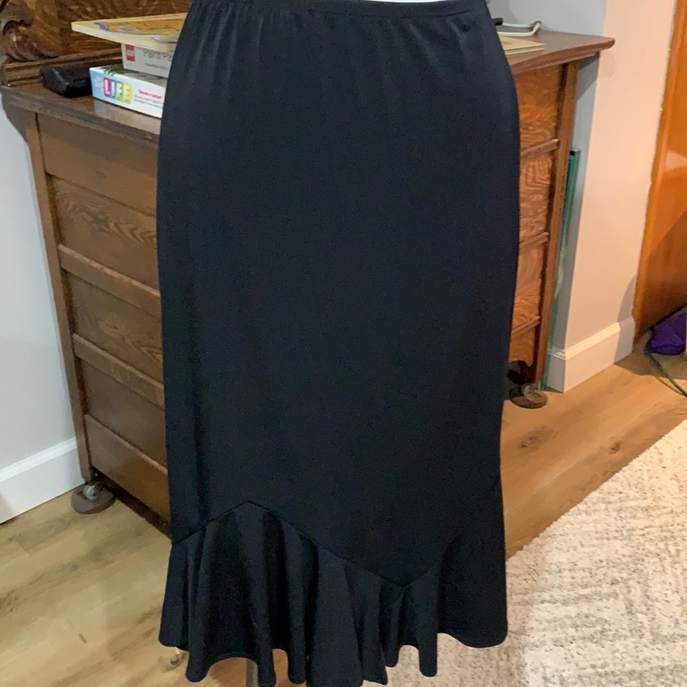 Ruffle black skirt.